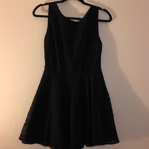 Black puff dress with deep v-back